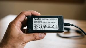 Close-up of a CPAP power supply label showing its rated wattage
